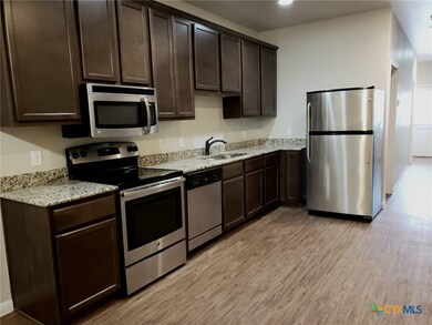 165 S Guadalupe St unit 212, San Marcos, TX 78666 - photo 2
