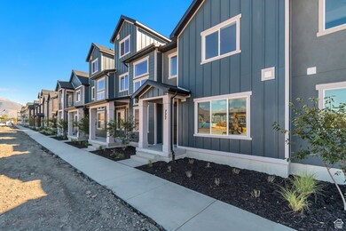 View of front of house featuring board and batten siding and a residential view