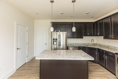 KITCHEN W/ GRANITE, SS APPLIANCES, PENDANT LIGHTS,