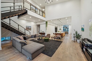 Soaring ceilings throughout including 13 feet ceil