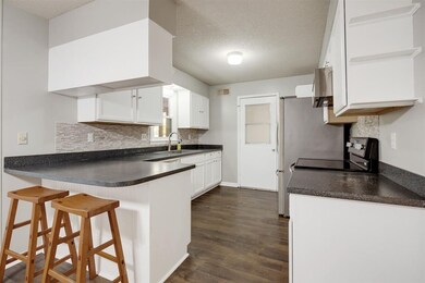 Kitchen cabinets & countertops installed one-year 
