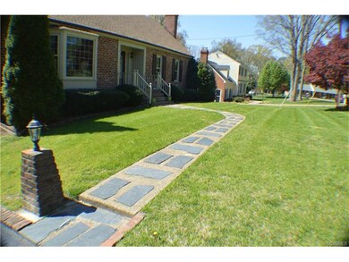 Walkway from driveway to the front of the house.
