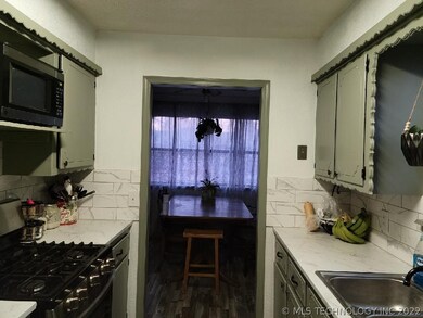 Gas stove new 2019. Kitchen to dining area.