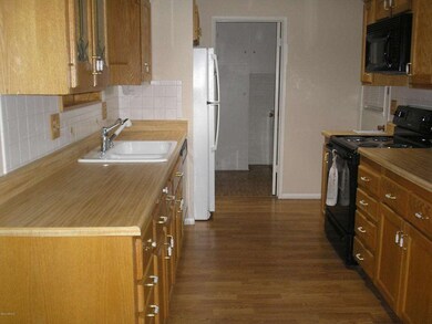 Lots of Cabinets and Drawers in Kitchen