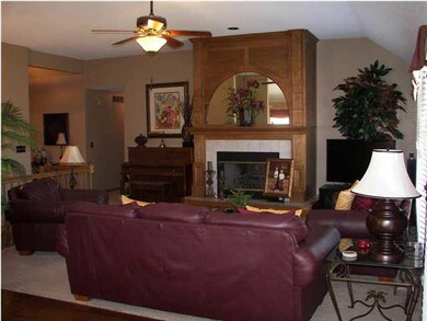 The living room is spacious. The carpet is less th