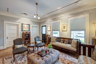 Another angle of the front living room. Window tre