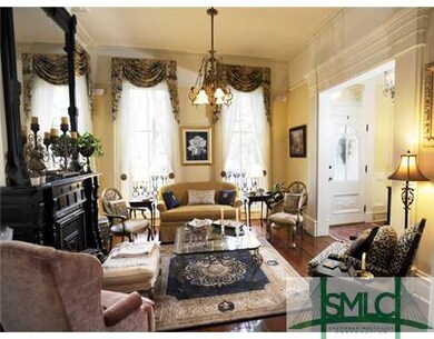 Living Room. Splendid front parlor with views of t