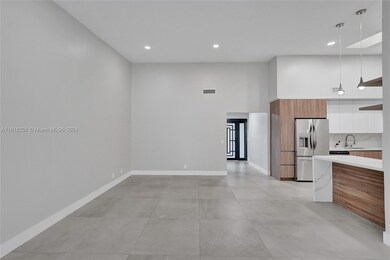 Oversized dining room area in open living room/dining room floor plan