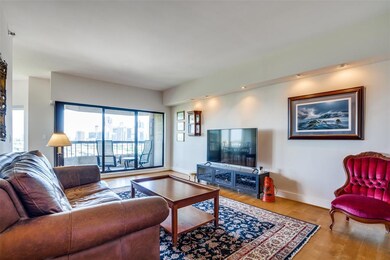 The light walls and maple wood-like flooring provi