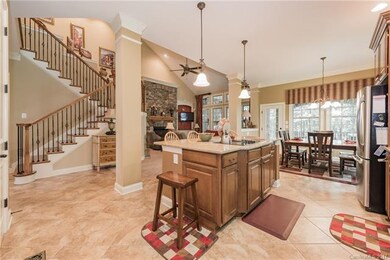 A view from the kitchen towards the great room and