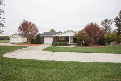 Front of Home and Detached Garage