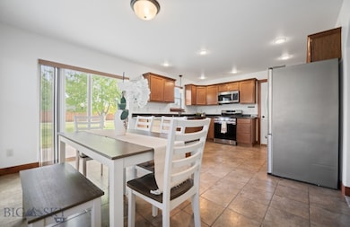 Virtually staged dining+ kitchen