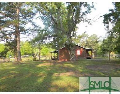 Exterior Front. With finished storage building