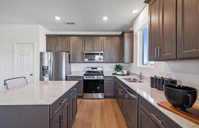 Bright kitchen with ample cabinet space  *Photos o