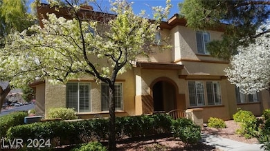 View of front of property featuring stucco siding