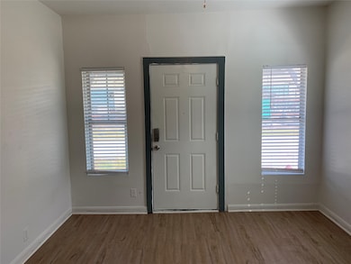 View of living room looking toward front door