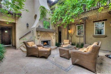 Private, enclosed courtyard with adjacent staircas
