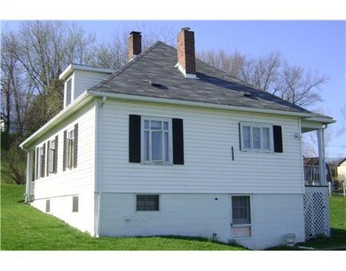 Exterior Back. Back of home, walk out basement. Ca