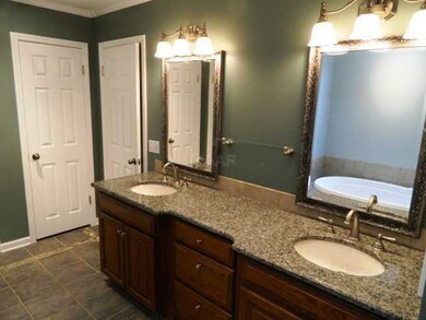 3 closets in master bath including a walk in close