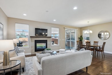 Spacious great room, 2-way fireplace to covered deck overlooking the back yard