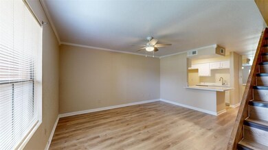 Unfurnished living room with light wood finished f