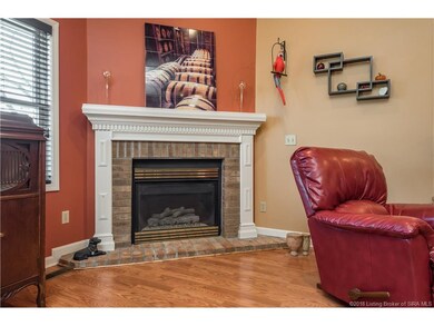 Lovely corner gas frieplace with brick surround/he