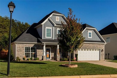 Quality stonework and hardie board craftsmanship exterior finishes