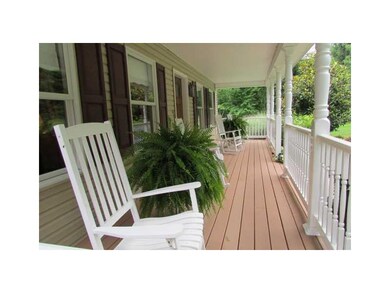 Patio/Deck. Spacious front porch. No maintenance r