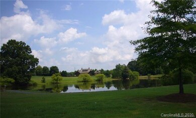 View across neighborhood pond to clubhouse