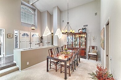 View of entry and formal dining room