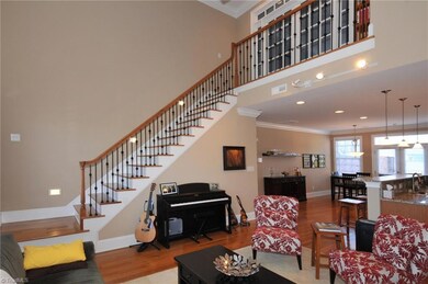 Staircase leading to master suite.
