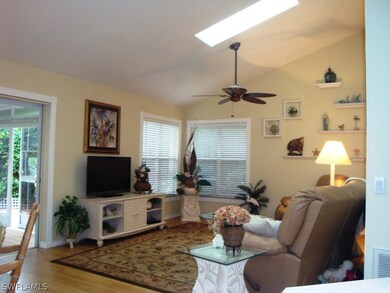 Living room.  There are two skylights in the living room/dining room area.