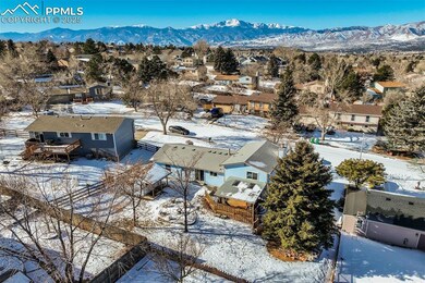 Snowy aerial view with a mountain view