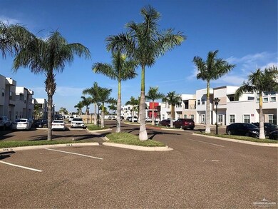 Parking within the complex and the pretty tree lined Palms.