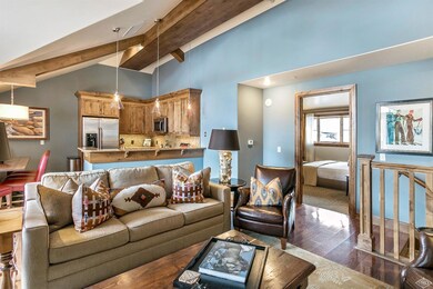 Main living room with a fireplace and va
