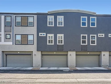 View of front facade featuring stucco siding