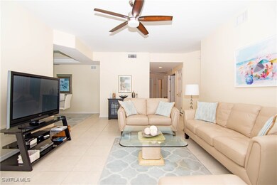 Spacious living room tastefully appointed with lea