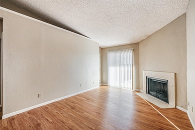 Gleaming hardwoods in family room. Large Balcony o