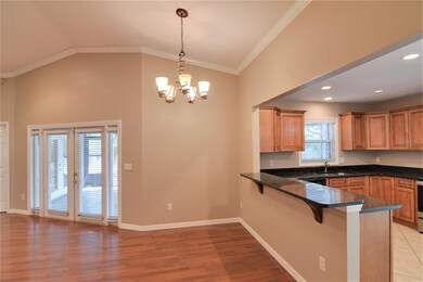 Great Room open to Dining and Kitchen