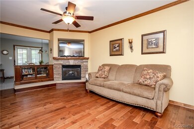Cozy up to the custom stone gas fireplace with woo