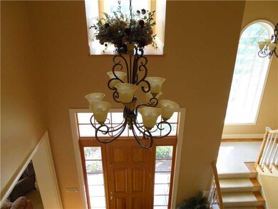 Entry/Foyer. Grand 2-story entrance foyer with har