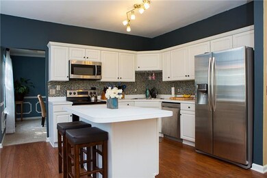 Dining room is right off of this beautiful kitchen