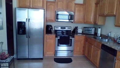 Solid Wood Cabinets & Stainless Steel Appliances