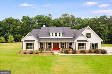 View of front of property with a porch and a front