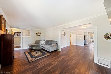 Season room with ample windows,and wood flooring