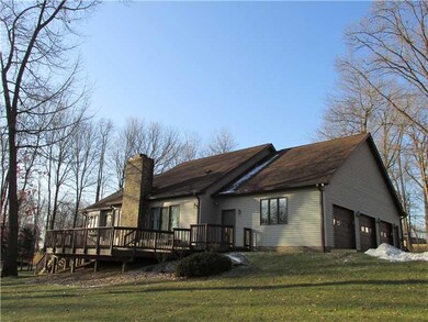 Exterior Back. Walk out onto the rear deck from th
