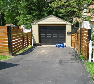 One car garage with additional parking spaces-off