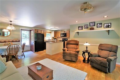 Open concept kitchen, dining and...