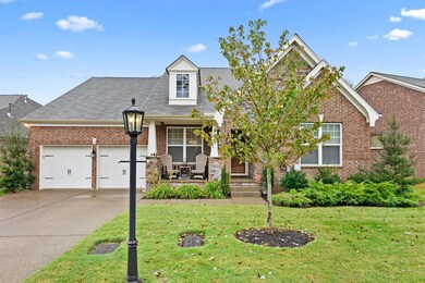 Beautiful mature landscaping. Two car Garage offers heavy duty storage racks