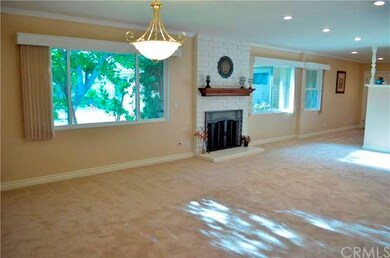 Family Room with Den in the corner with half wall 